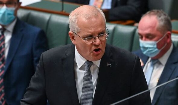 Labor's lead over Scott Morrison's Liberal Coalition narrows as Australians head to polls
